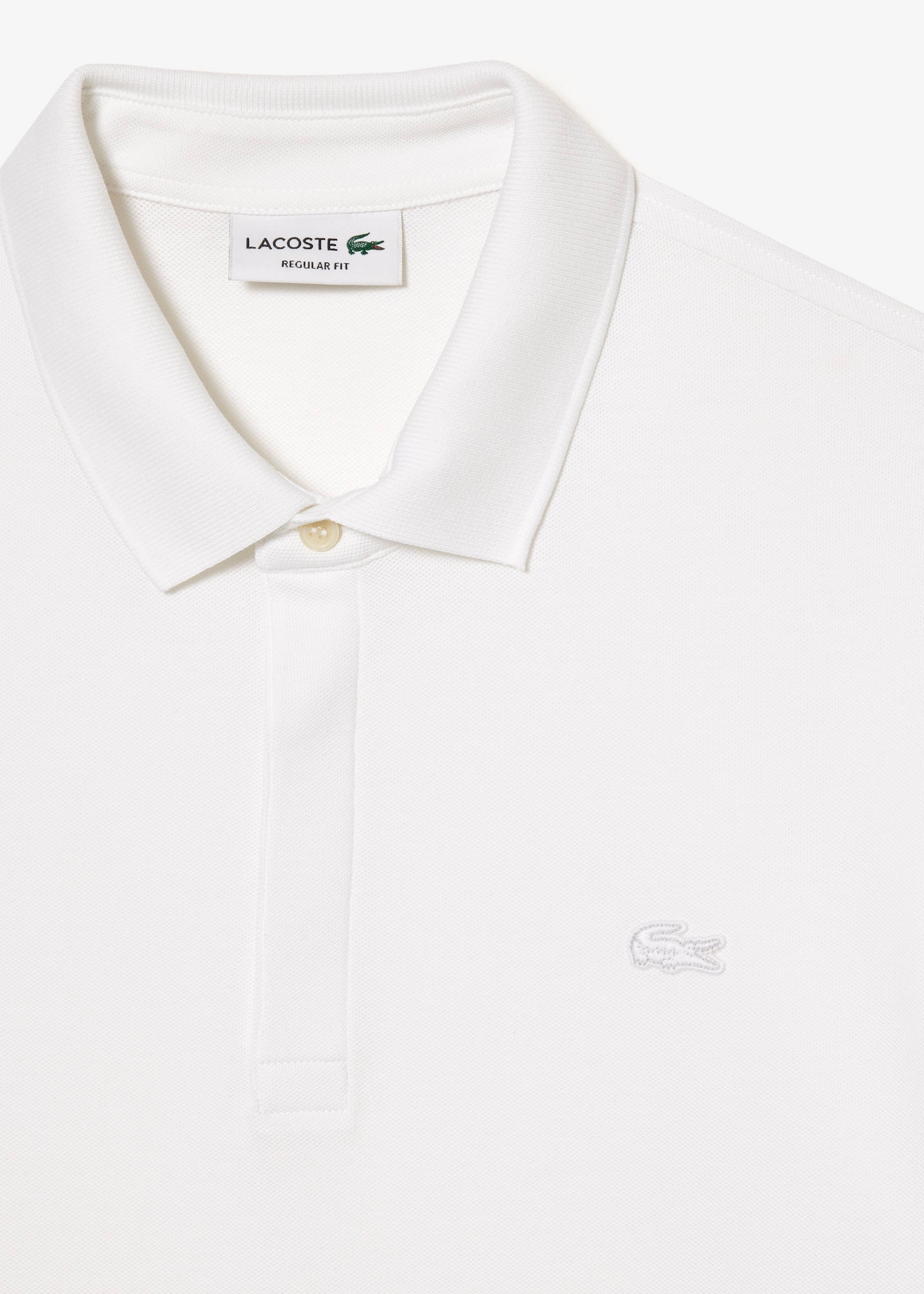 Polo Paris manches longues Lacoste blanc